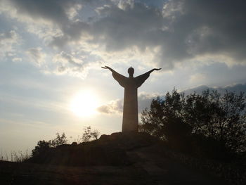 Low angle view of statue against sky