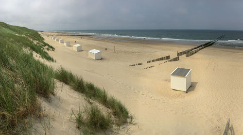 Scenic view of beach against sky
