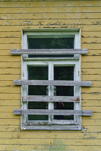 Closed window of old building