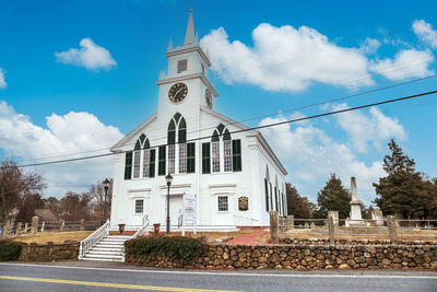 Blue sky over the congregational church of south dennis - low angle