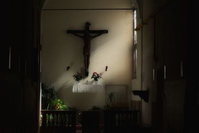 Statue in illuminated temple