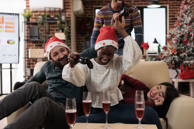 Group of people sitting at restaurant