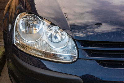 Close-up of car against sky