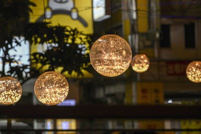 Close-up of illuminated light bulb