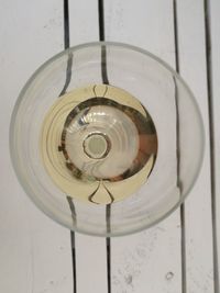 Directly above shot of electric lamp on wall