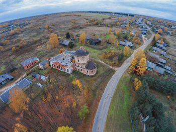 Fish-eye view of town against sky