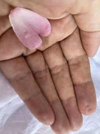 Close-up of woman holding hands