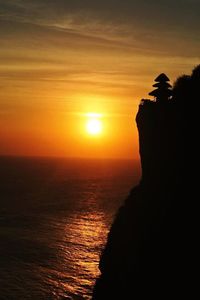 Scenic view of sea at sunset