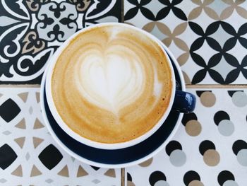 Close-up of cappuccino on table