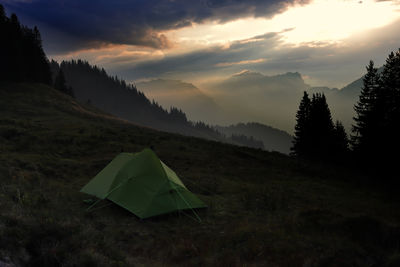 Tent on an alpine meadow in obwalden. obwaldner höhenweg, chrüzliegg. switzerland.