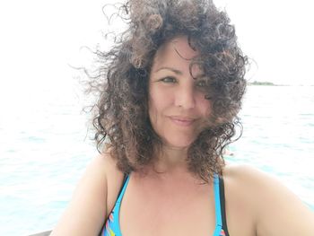 Close-up of beautiful woman at beach