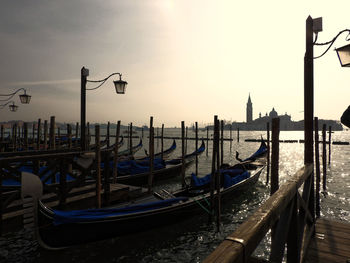 Boats moored in sea