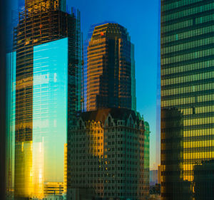 Low angle view of modern buildings in city