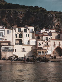 Buildings by lake