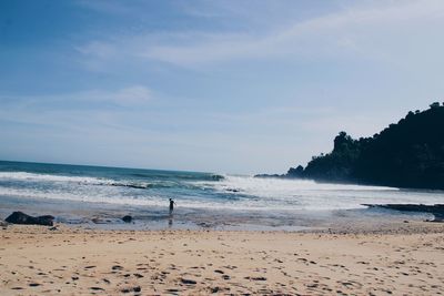 Scenic view of beach against sky