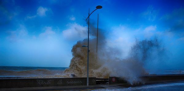 Scenic view of sea against blue sky