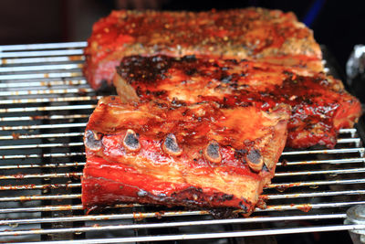 Close-up of meat on barbecue grill