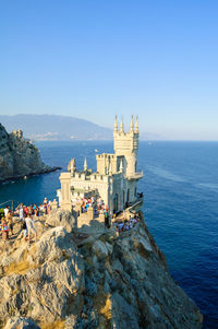 Scenic view of sea against clear blue sky