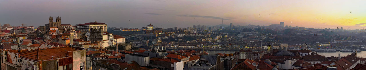 High angle view of city buildings during sunset