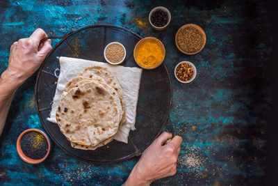 High angle view of man preparing food