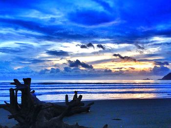 Scenic view of sea against sky at sunset