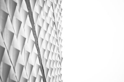Close-up of blinds against white background