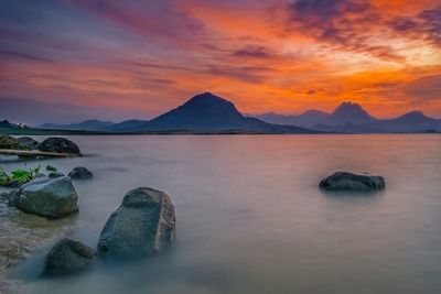 Scenic view of sea against sky during sunset