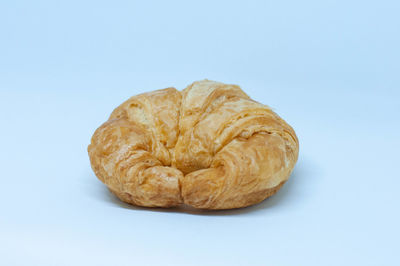 High angle view of bread against white background