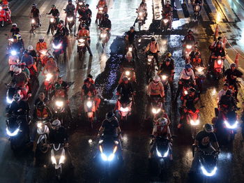 Motorcycles on illuminated street
