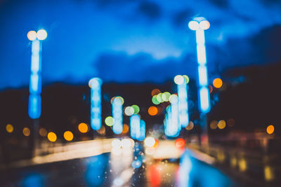 Illuminated street lights at night