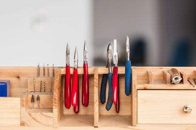 Close-up of paintbrushes on table