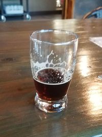 Close-up of beer in glass on table