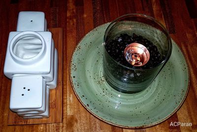 High angle view of wine in glass on table