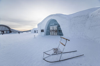 Built structure on snow covered landscape