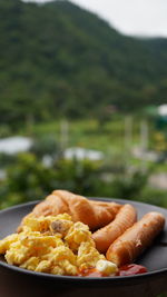 Close-up of breakfast served on table