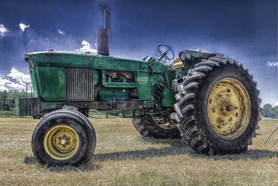 Old tractor on field