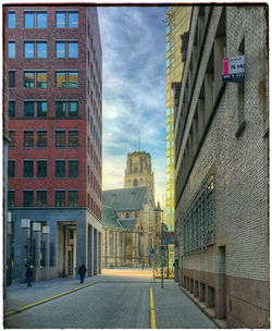 Narrow alley along buildings