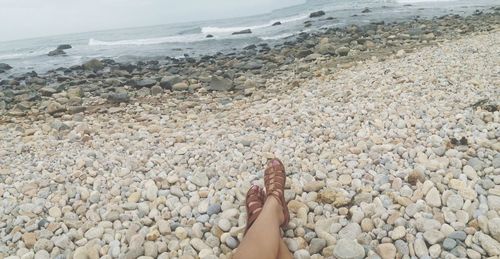 Low section of people on beach