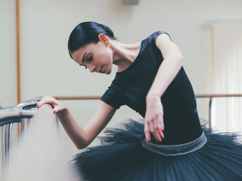 Dancer dancing in ballet studio