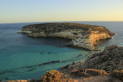 Scenic view of sea against clear sky