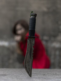 Close-up of person holding umbrella