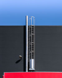 Metal structure against blue sky