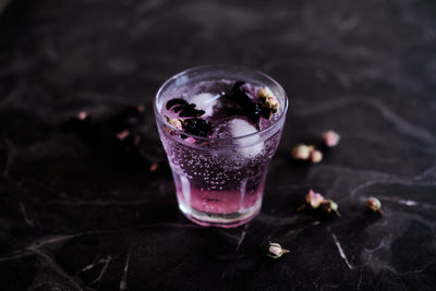 High angle view of drink in glass on table