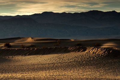 Scenic view of landscape against sky during sunset