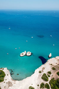 High angle view of sea shore against sky