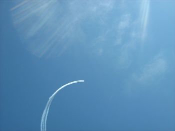Low angle view of planes flying in sky during airshow