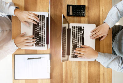 Man using laptop on table
