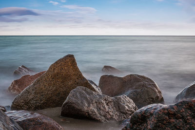 Scenic view of sea against sky during sunset