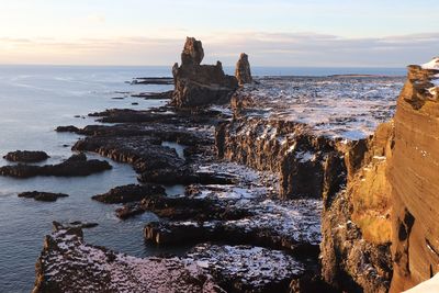 Panoramic view of sea against sky during sunset
