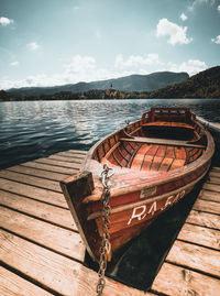 Pier over lake against sky